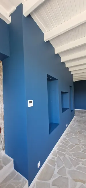 Completed blue feature wall and recessed alcoves